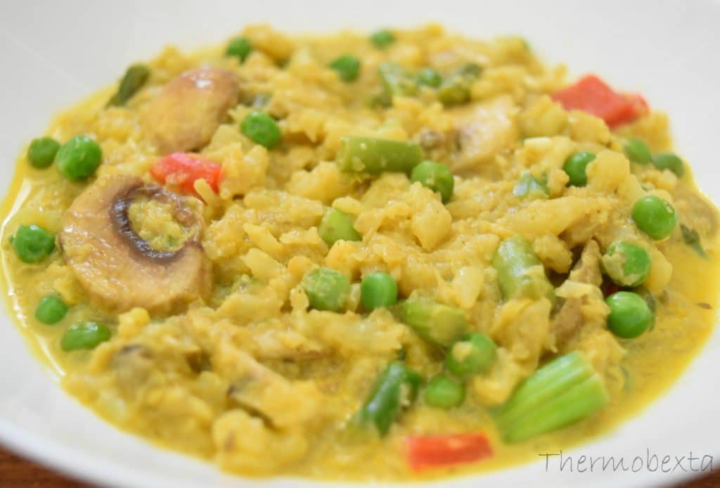 cauliflower risotto thermomix close up in white bowl