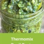 Zoomed in photo of green Thermomix pesto sauce in jar