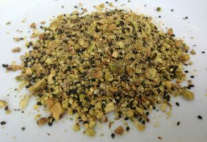 pistachio dukkah on white plate