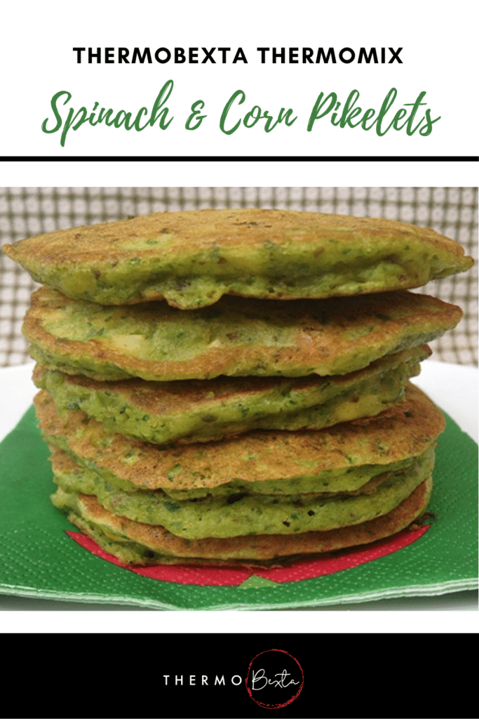 stack of green tinged savoury spinach and corn spikelets on green napkin with green and white background