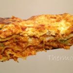 thermomix vegetable lasagne large piece with light coloured background