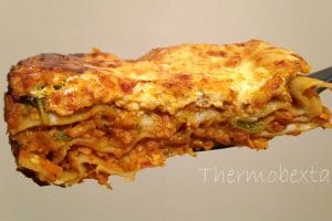 thermomix vegetable lasagne large piece with light coloured background