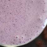 above shot of glass of thermomix banana blueberry smoothie