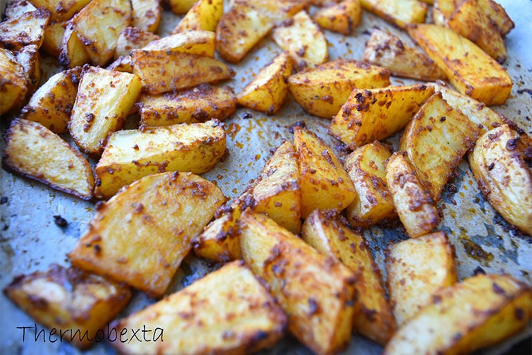 thermomix potato wedges, cooked, on tray