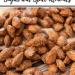 sugar and spice almonds close up with branding and recipe title for Pinterest