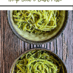 text 'thermobexta thermomix hemp seed and basil pesto' at top, image of two half bowls of pesto pasta. Green strip at bottom containing thermobexta logo