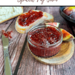 text 'thermomix spiced fig jam' at top, then image of jam in small jar from side angle, jam spread on bread and knife and figs in background, all on wooden table. 'thermobexta' logo at bottom in coloured strip