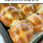 close up of corner of a tray of hot cross buns, Pinterest pin