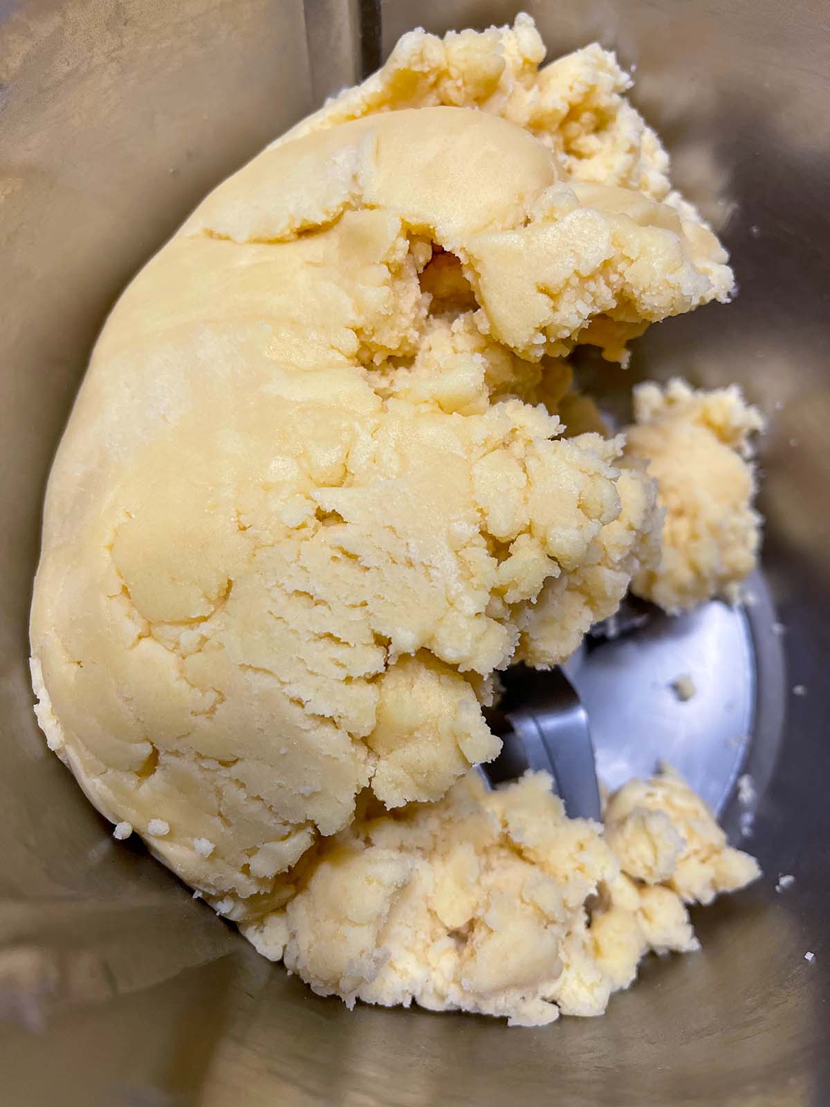 yellow shortbread dough inside thermomix bowl