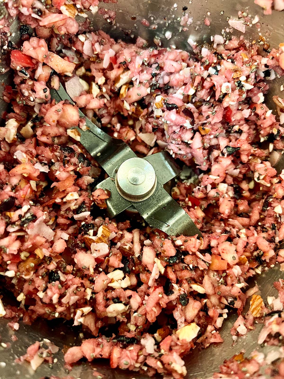 Birdseye view of fruit breakfast - in thermomix bowl after chopping