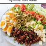 pinterest pin cobb salad on white plate on white surface